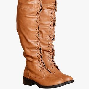 Thigh high boots in brown